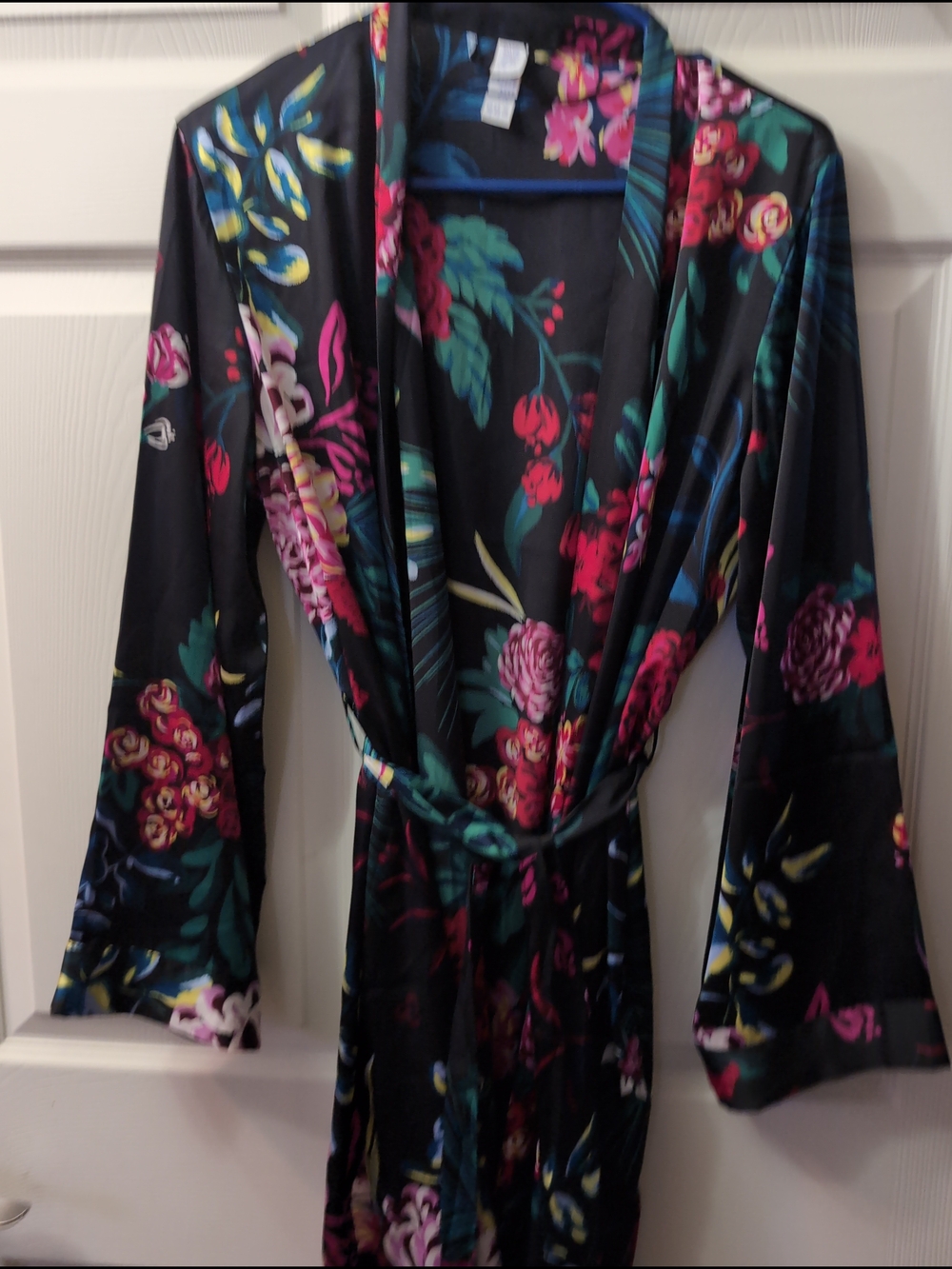 stars above Black Floral Satin Robe with Pink and Green Accents